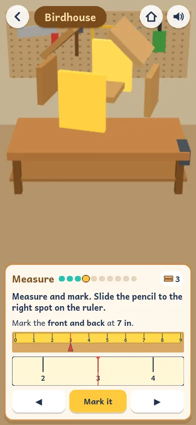 Measuring a board for the Birdhouse in the Woodshop